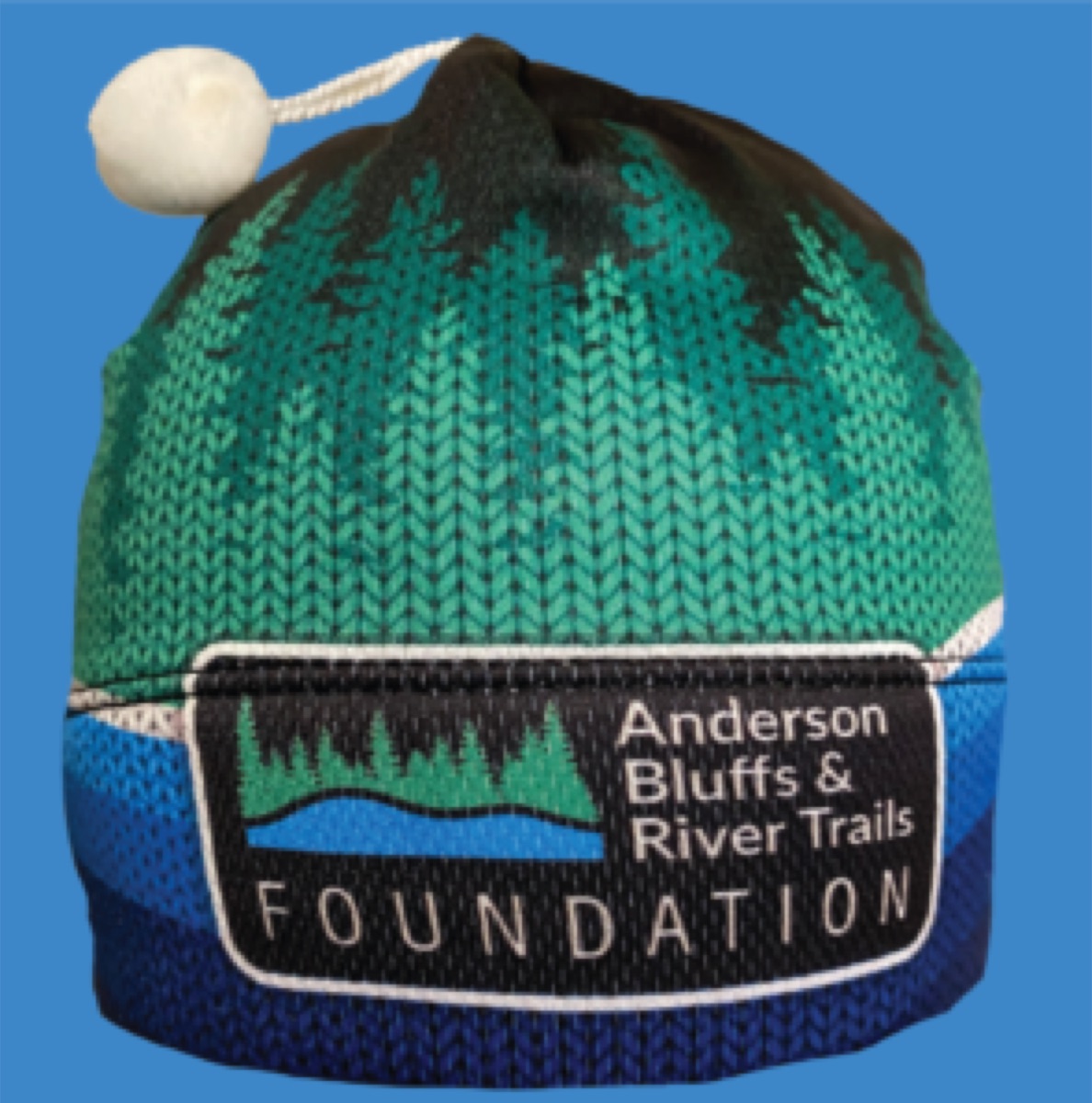 Sublimated nordic ski cap with tassel for the Anderson Bluffs and River Trails Foundation